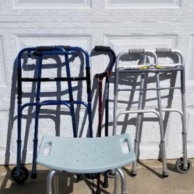Lot 2-295: Bundle of Walkers, Canes and Shower Seat