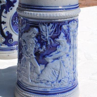 Lot 2-343: Large 1/2 Liter GERMANY Drinking Stein Set w/ 5 Glasses and 1 Tall Pitcher (lid is damaged)
