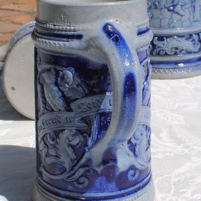 Lot 2-343: Large 1/2 Liter GERMANY Drinking Stein Set w/ 5 Glasses and 1 Tall Pitcher (lid is damaged)