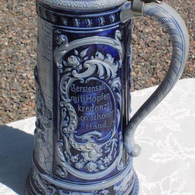 Lot 2-343: Large 1/2 Liter GERMANY Drinking Stein Set w/ 5 Glasses and 1 Tall Pitcher (lid is damaged)