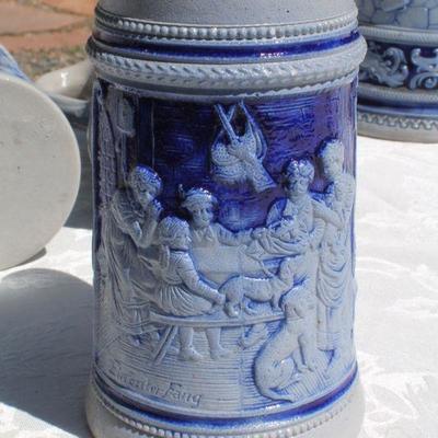 Lot 2-343: Large 1/2 Liter GERMANY Drinking Stein Set w/ 5 Glasses and 1 Tall Pitcher (lid is damaged)