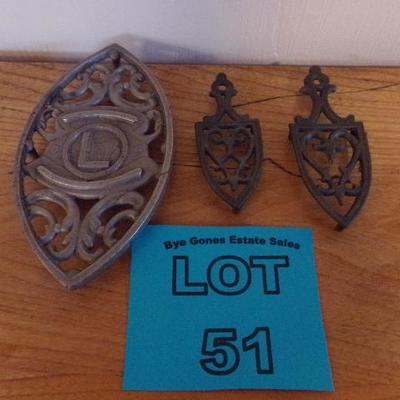 LOT 51  VINTAGE CAST-IRON TRIVETS