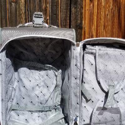 Lot 2-412: (3) Large Assorted Travel Luggage