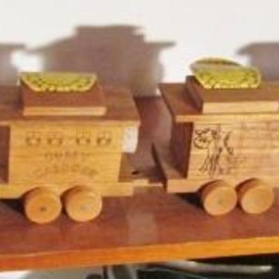 B-9  FOUR PIECE WOODEN COIN BANKS