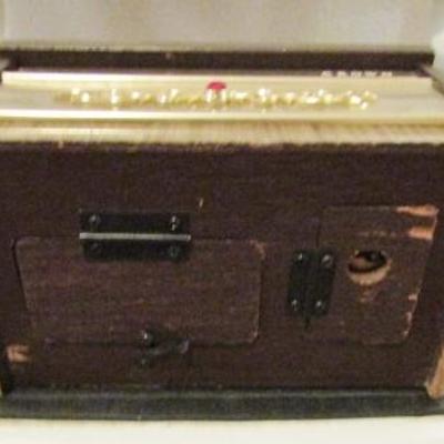 H-64  HEADPHONES, CORDLESS PHONES, MUSICAL COIN BANK AND MORE