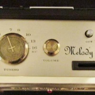 H-64  HEADPHONES, CORDLESS PHONES, MUSICAL COIN BANK AND MORE