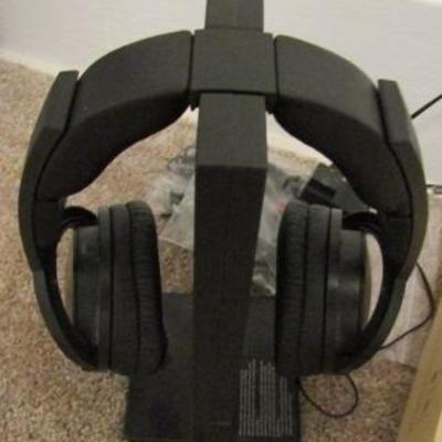 H-64  HEADPHONES, CORDLESS PHONES, MUSICAL COIN BANK AND MORE