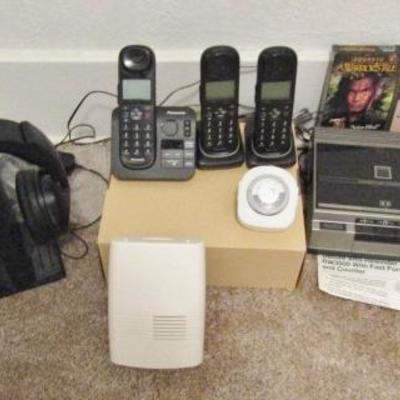 H-64  HEADPHONES, CORDLESS PHONES, MUSICAL COIN BANK AND MORE