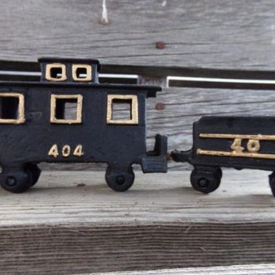 LOT 131  CAST IRON 4 PIECE TRAIN