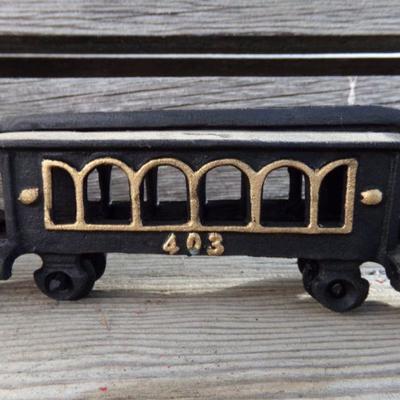 LOT 131  CAST IRON 4 PIECE TRAIN