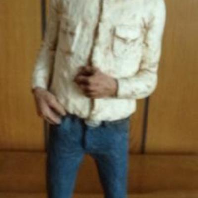 H-80  TWO MICHAEL GARMAN COWBOY STATUES