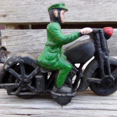 LOT 201  CAST IRON MOTORCYCLIST & SUV