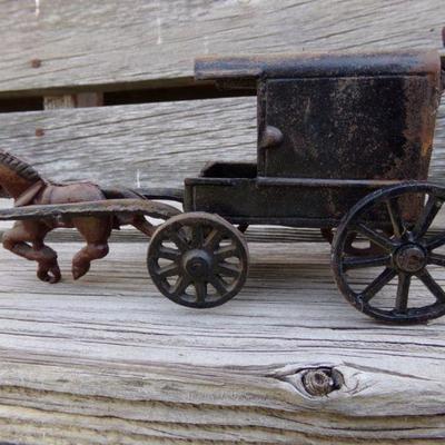 LOT 203  CAST IRON HORSE DRAWN TOYS
