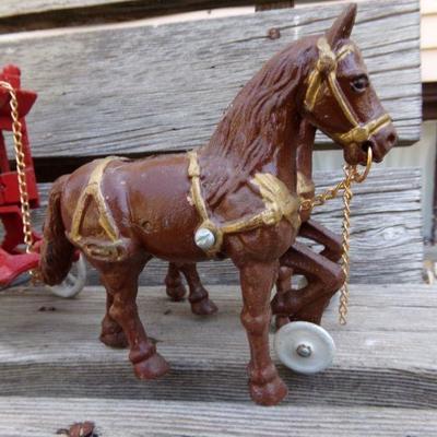 LOT 203  CAST IRON HORSE DRAWN TOYS