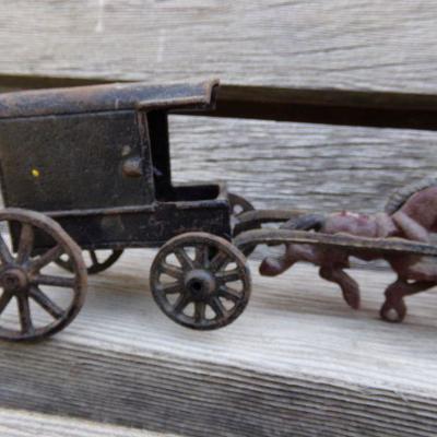 LOT 203  CAST IRON HORSE DRAWN TOYS
