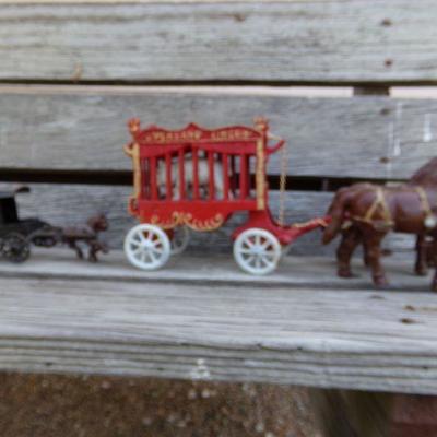 LOT 203  CAST IRON HORSE DRAWN TOYS