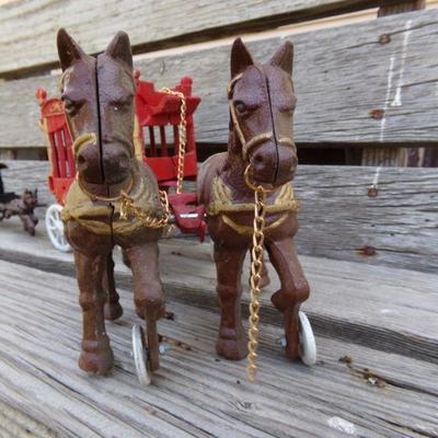 LOT 203  CAST IRON HORSE DRAWN TOYS