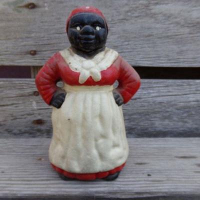 LOT 204  CAST IRON AUNT JEMIMA BANK & TOY CARS