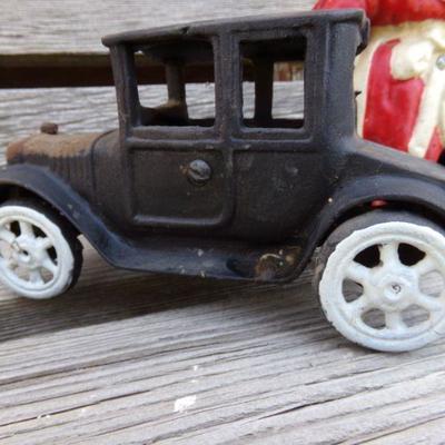 LOT 205  AUNT JAMIMA CAST IRON BANK & TOY TRUCK