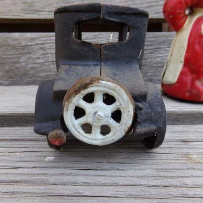 LOT 205  AUNT JAMIMA CAST IRON BANK & TOY TRUCK