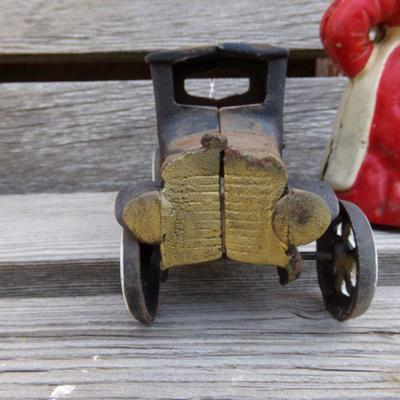 LOT 205  AUNT JAMIMA CAST IRON BANK & TOY TRUCK
