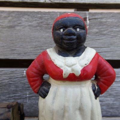LOT 205  AUNT JAMIMA CAST IRON BANK & TOY TRUCK