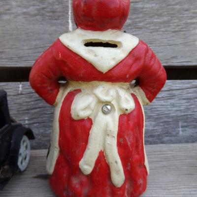 LOT 205  AUNT JAMIMA CAST IRON BANK & TOY TRUCK