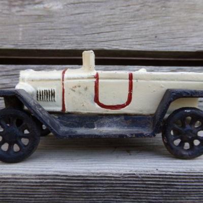 LOT 206  CAST IRON MOTORCYCLE COP? & CONVERTIBLE TOY CAR