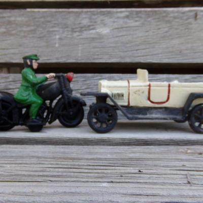 LOT 206  CAST IRON MOTORCYCLE COP? & CONVERTIBLE TOY CAR
