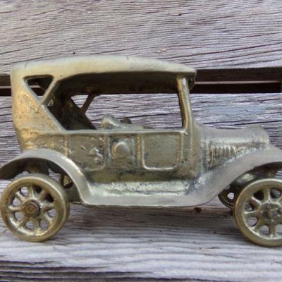 LOT 207  CAST IRON MOTORCYCLE COP & TOY CAR