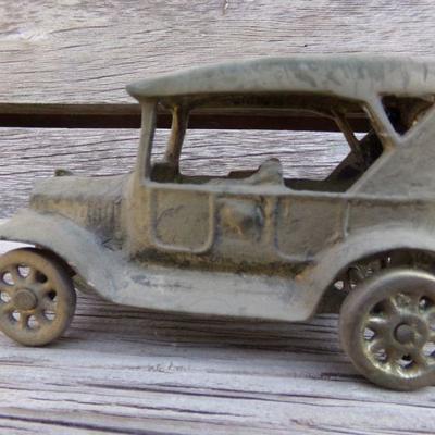 LOT 207  CAST IRON MOTORCYCLE COP & TOY CAR