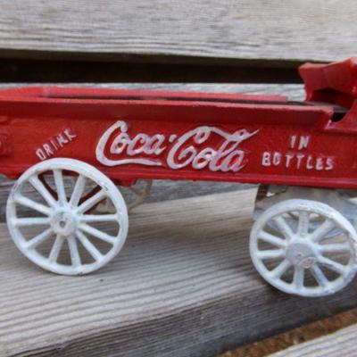 LOT 208  CAST IRON COCA COLA HORSE DRAWN TOY