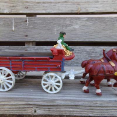 LOT 209  CAST IRON HORSE DRAWN WAGON TOY