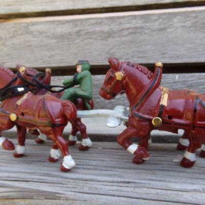 LOT 209  CAST IRON HORSE DRAWN WAGON TOY