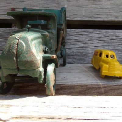 LOT 212  CAST IRON TOY DUMP TRUCK AND COCA COLA VEHICLE