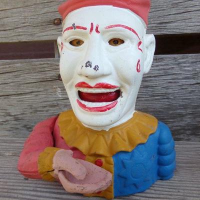 LOT 215  CAST IRON CLOWN COIN BANK