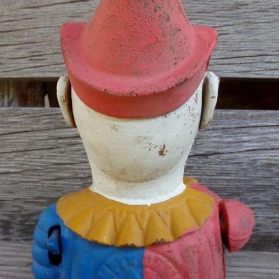LOT 215  CAST IRON CLOWN COIN BANK