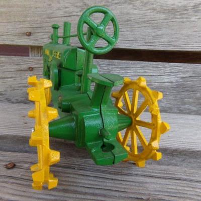 LOT 216  JOHN DEERE TRACTOR CAST IRON TOY
