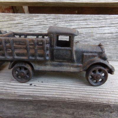 LOT 217  TWO CAST IRON TOY TRUCKS
