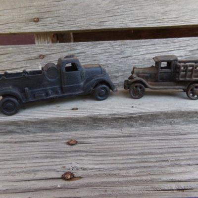 LOT 217  TWO CAST IRON TOY TRUCKS