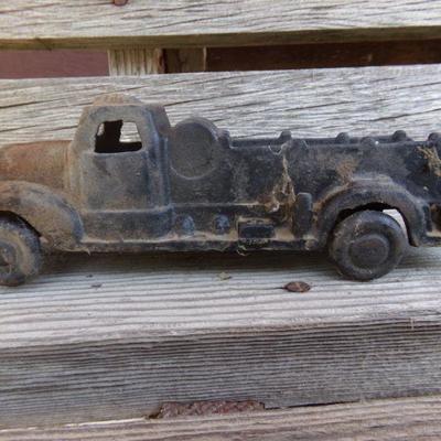 LOT 217  TWO CAST IRON TOY TRUCKS