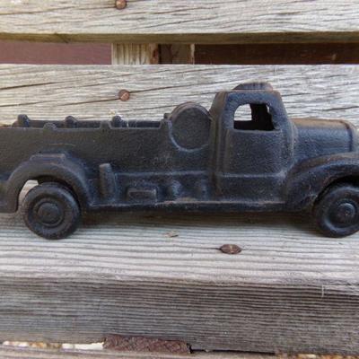 LOT 217  TWO CAST IRON TOY TRUCKS