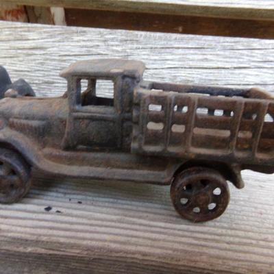 LOT 217  TWO CAST IRON TOY TRUCKS