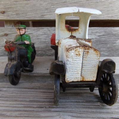 LOT 218  CAST IRON MOTORCYCLE COP AND TRUCK
