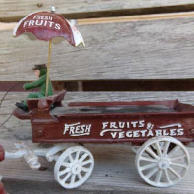 LOT 219  CAST IRON FRUIT CART AND CAR TOYS