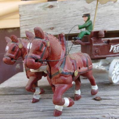 LOT 219  CAST IRON FRUIT CART AND CAR TOYS