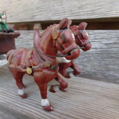 LOT 219  CAST IRON FRUIT CART AND CAR TOYS