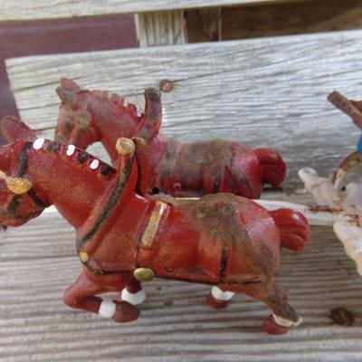 LOT 220  CAST IRON TOYS