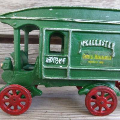 LOT 223  CAST TRACTOR AND MERCHANDISE TRUCK