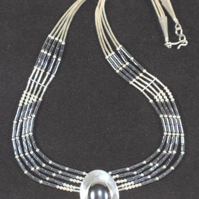 LOT#A32: Marked Sterling Liquid Silver Necklace with Hematite Stones